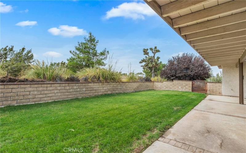 Block wall for perimeter of grass area with gates on either end