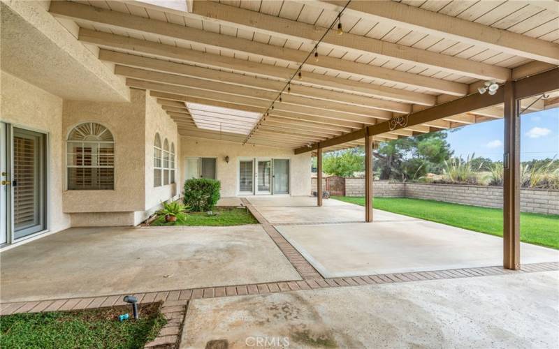 Patio is accessed through primary bedroom, Kitchen, Main hallway, AND the ADU.