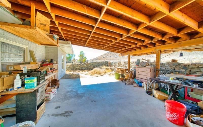 Shaded patio in the backyard that can be your workshop