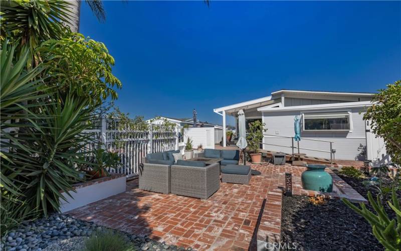 Custom Designed yard for endless gatherings in lovely Newport Beach Bayside Village Community.