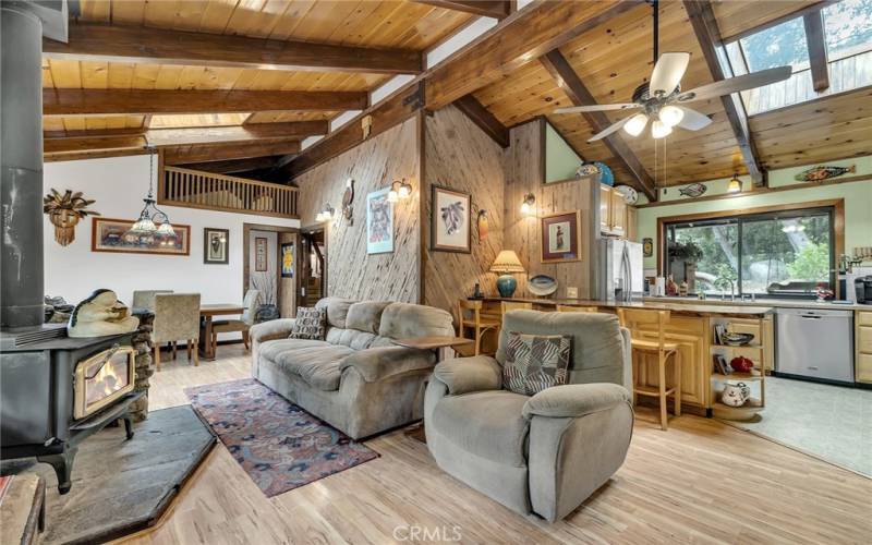 Living room, dining area, and kitchen.