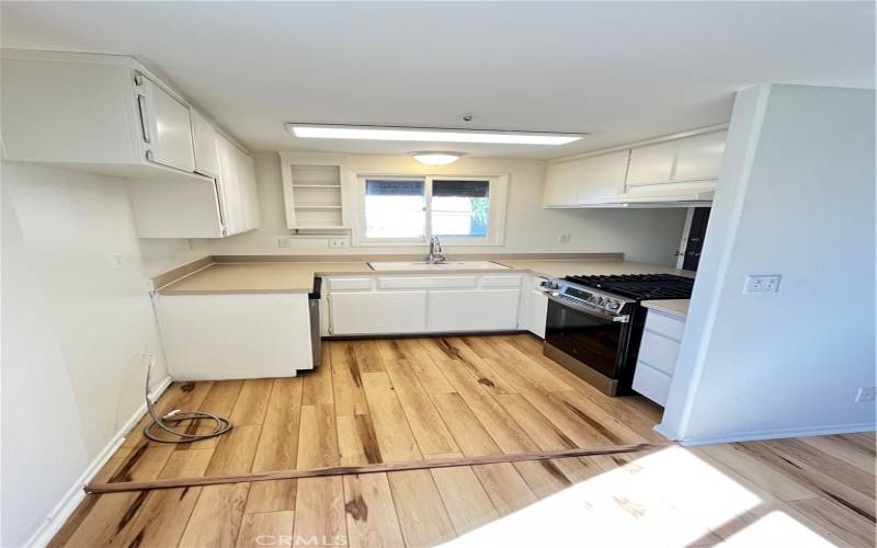 Kitchen - New dishwasher and new gas oven/range.