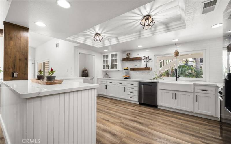 Large, remodeled kitchen that looks out to the extra-large backyard.