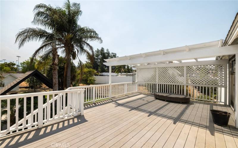 Large, covered wood deck off the primary suite!