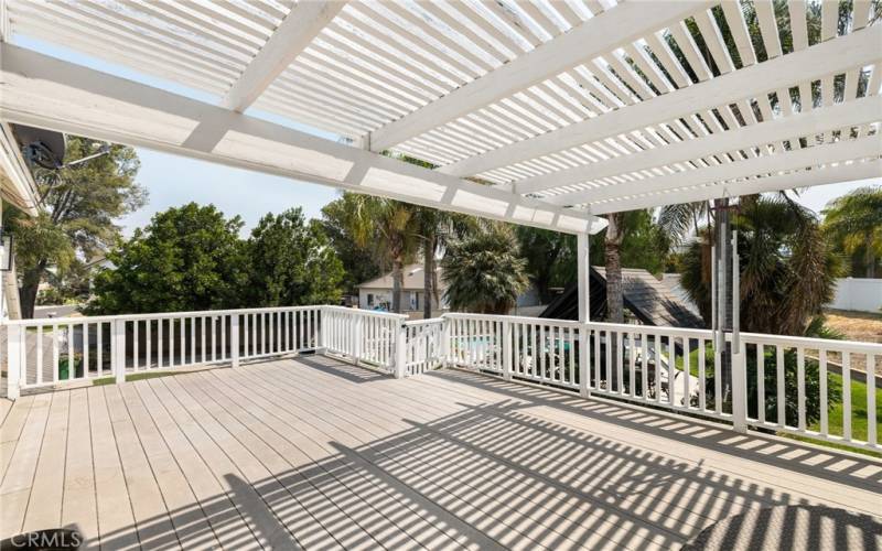 Larger wood deck just off the Primary bedroom and bathroom.