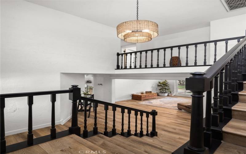 Foyer area with high ceilings and a new chandelier!