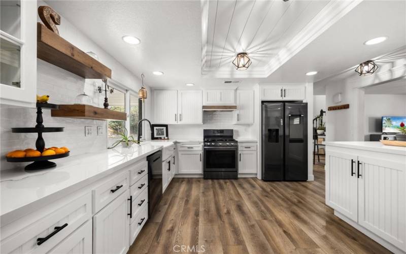 Remodeled kitchen with Porcelain counter tops and all new appliances, light fixtures and faucet.