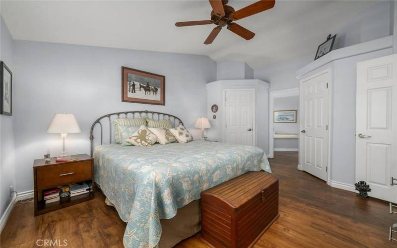 Master bedroom features two separate walk-in closets.