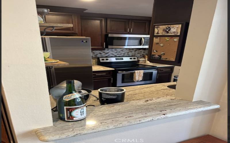 Kitchen with View of Living Room