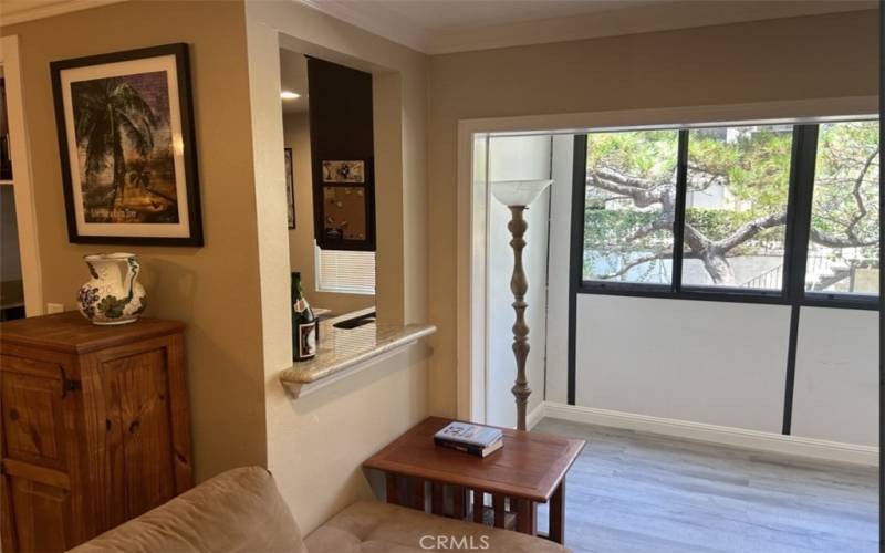 Open View of Living Room and Enclosed Patio from Kitchen