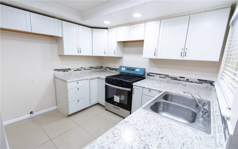 Kitchen with Brand New Stove