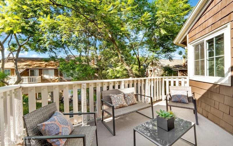 private patio overlooking the soothing sounds of a bubbling brook