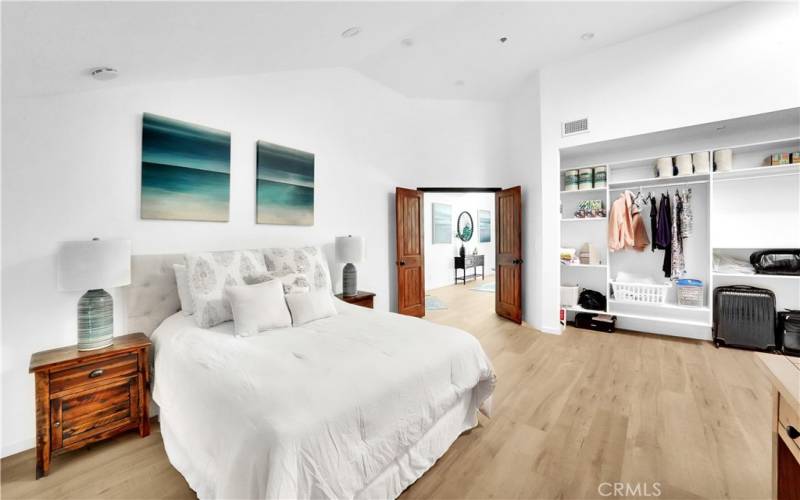 Large bedroom with double door entry