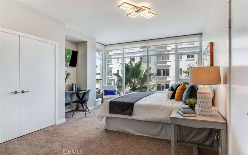 The east-facing Primary Bedroom is very large, light and bright and has having room for a desk and sitting area.