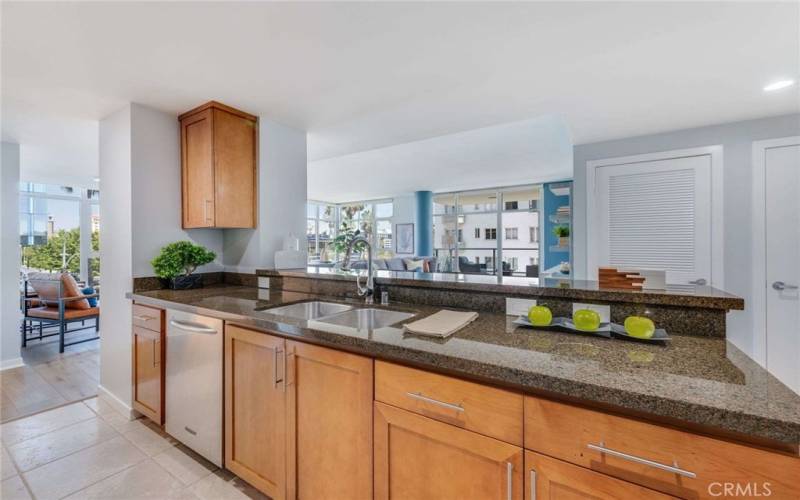 Meal prep will be a breeze with the abundance of granite countertop. Serve directly to the Great Room.