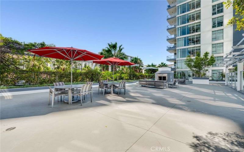 The east side of the Pool Deck has two fireplaces with comfortable lounge seating and two dining tables. Host your own nighttime soiree or dig into a good book.