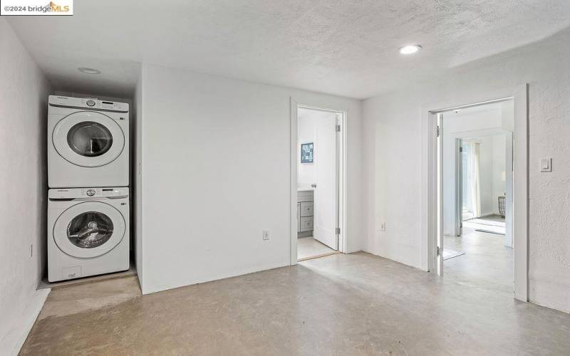 Stacked washer and dryer in garage