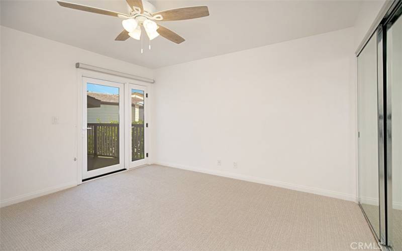 Secondary bedroom with its own deck and view.