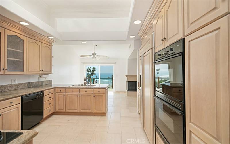 Watching the water from the kitchen.