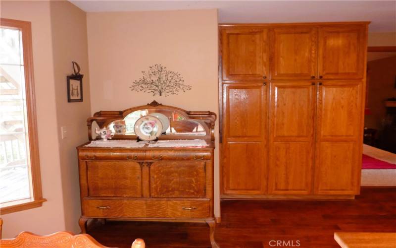 On the other side of the doorway to the dining room is lots more cabinets for additonal .