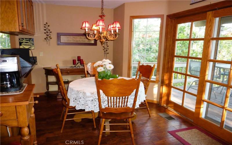 The dining nook is the perfect place for informal dining. It also has easy access to the rear deck via the sliding glass doors.