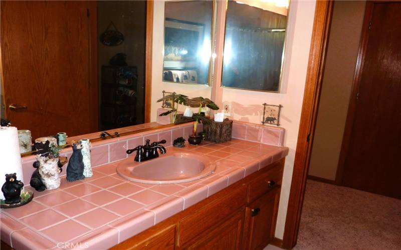 Tile sink in the main bathroom on the upper level.