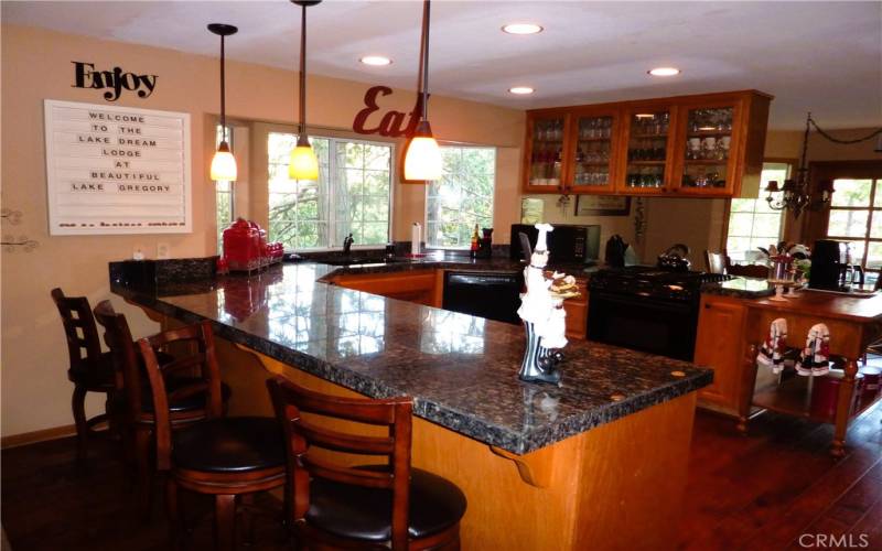 The kitchen is right next to the family room. It's open to the family room and the dining nook on the rear of the home.