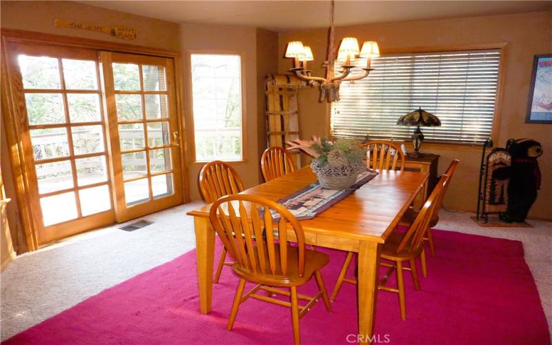 Lots of windows in the dining room and a sliding glass door for easy access to the rear deck.