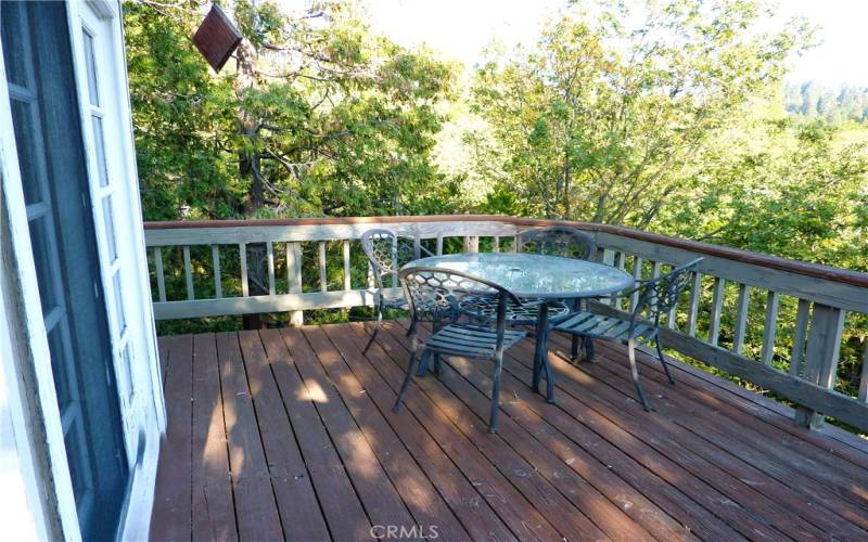 The patio table and chairs on the Master Deck are the perfect place to enjoy the fresh ountain air.