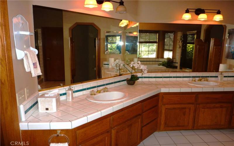 Double sinks in the master bedroom are separated so there's plenty of room.