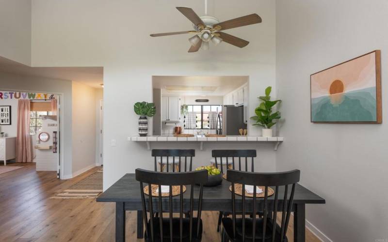 Dining room and counter bar that looks into the kitchen.