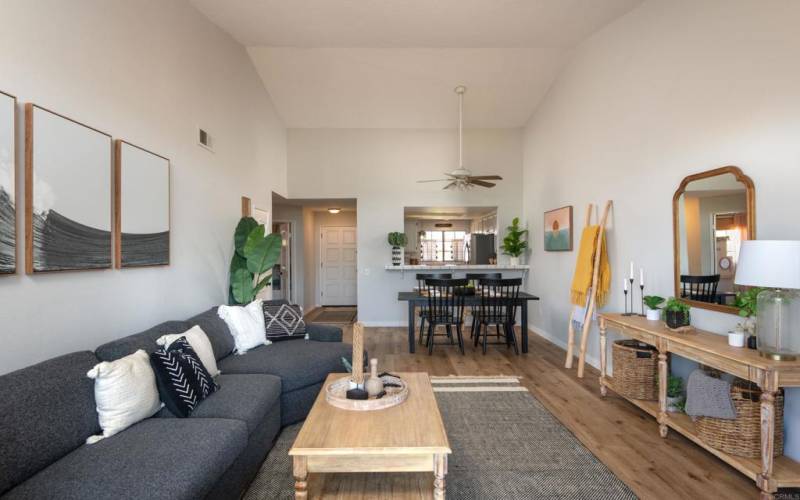 Open floor plan with living room, dining room, and kitchen.