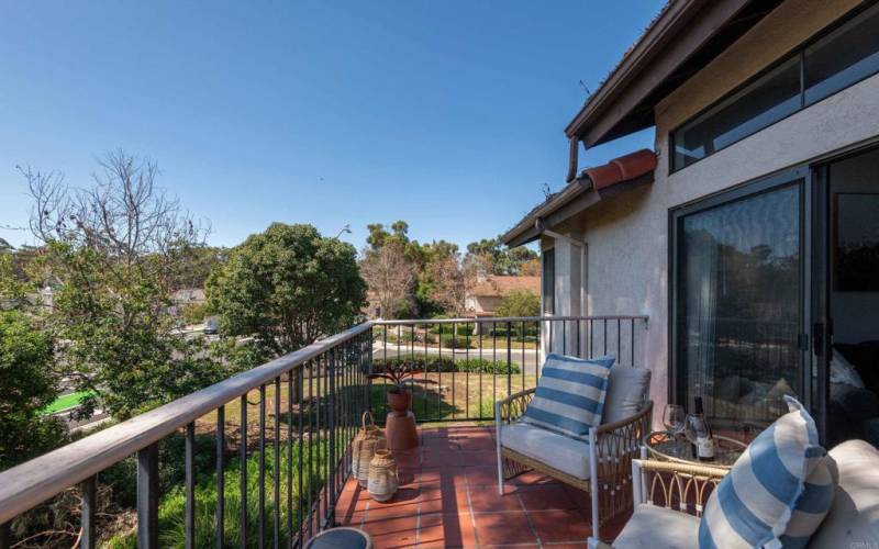 Large patio off of the living room offers an outdoor retreat to enjoy your morning coffee.