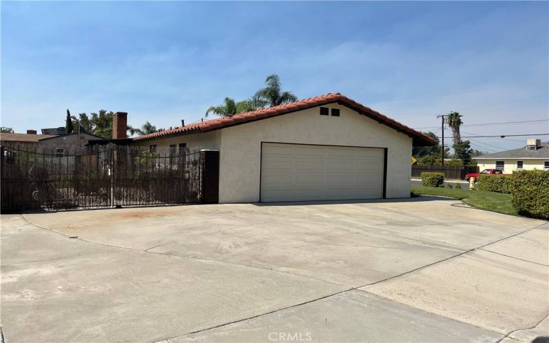 2 car attached garage and RV access on concrete