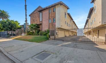 This beautiful tri-level townhome with abundant upgrades is located in one of Panorama City’s most sought-after gated communities, Willis Place Townhomes.  The lush green landscaping and colorful flower beds enhance its eye-catching curb appeal.