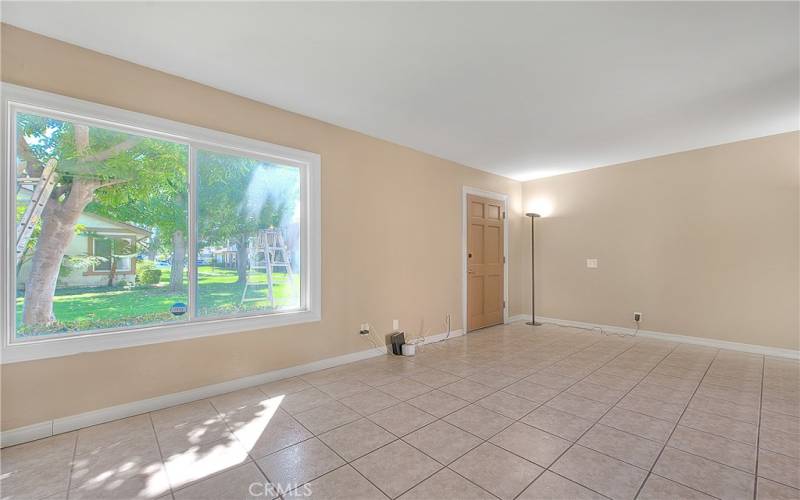 Front door entrance leading into living room