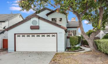 This wonderful home is located on a quiet tree-lined street in one of Simi Valley’s most sought-after neighborhoods. The grassy area, colorful flowerbeds, towering shade tree, and freshly painted siding enhance its eye-catching curb appeal.