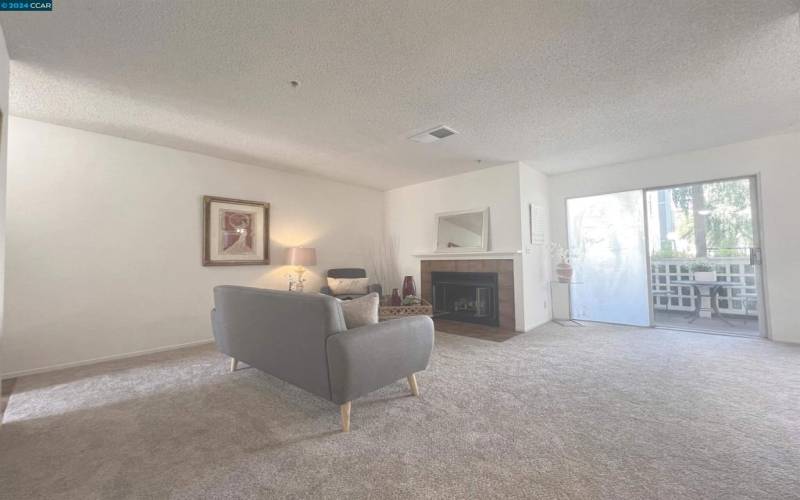 Living Room with Fireplace and Sliding Glass Doors