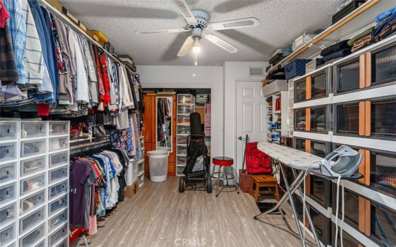 THIS CLOSET!  Formerly a small bedroom, it's now part of the primary suite.