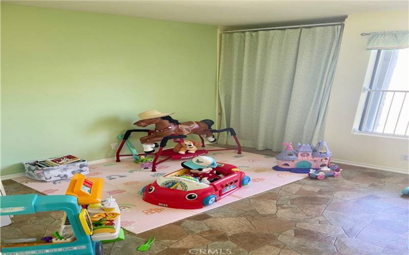 bedroom 2 used currently as a playroom