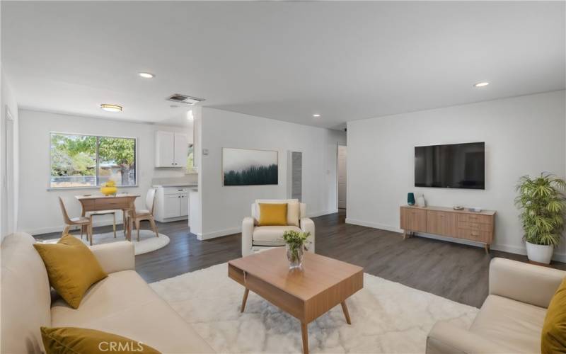 Living room & view of kitchen (virtually staged)