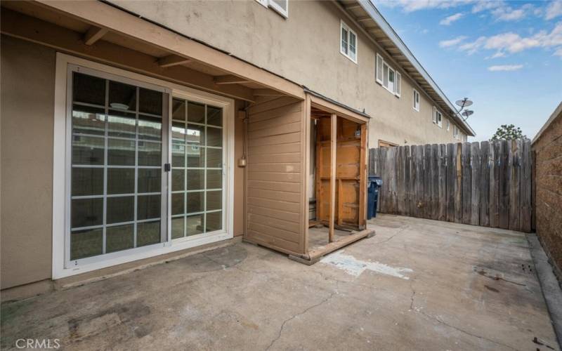 Patio with additional storage space.