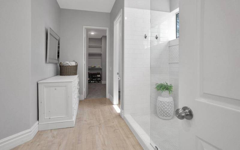 Primary bathroom, huge walk-in closet