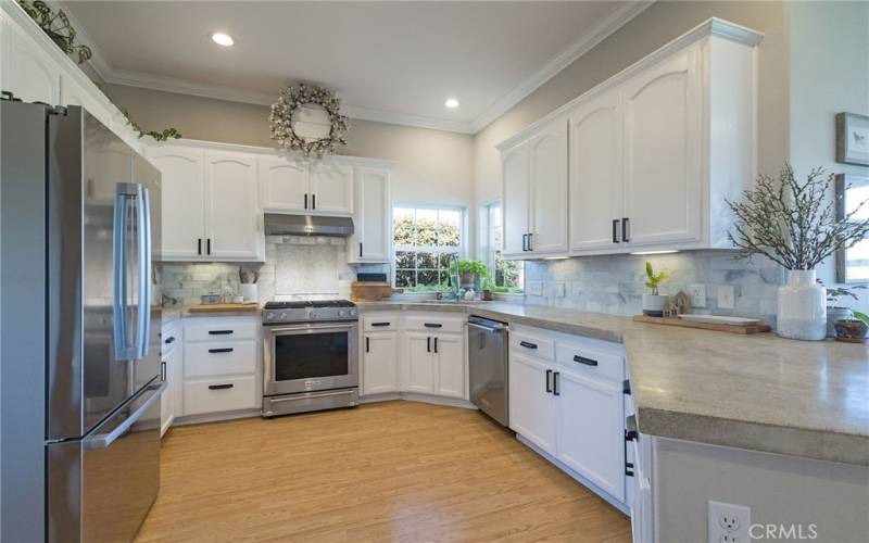 Remodeled Kitchen w/ Gas Range and Concrete Countertops