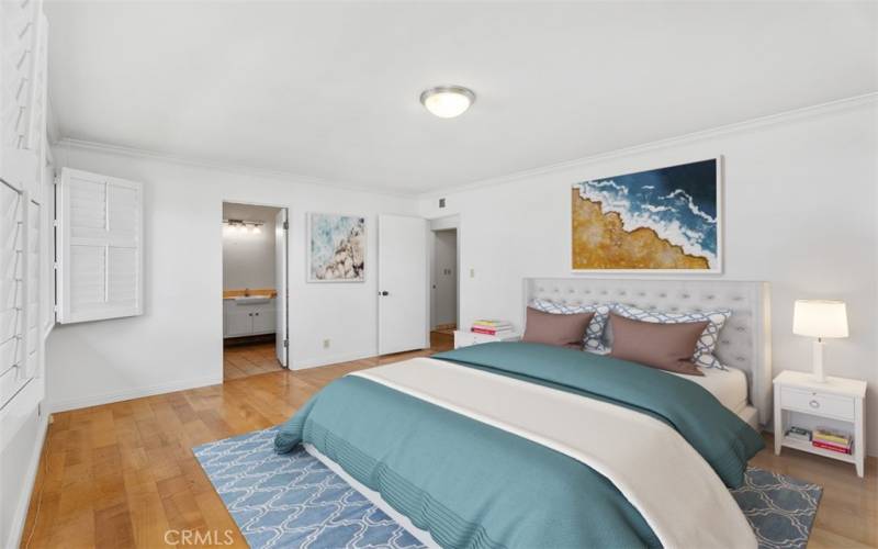 Primary bedroom is large and features convenient en-suite bathroom access. VIRTUALLY STAGED