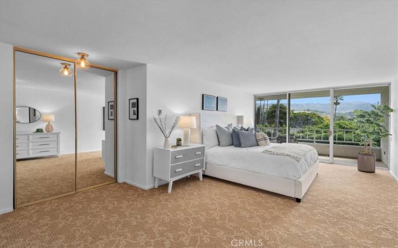 Spacious primary suite w/ balcony access and beautiful views!