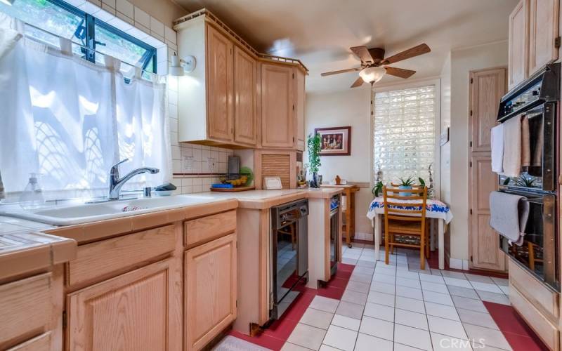 Note kitchen eating area and pantry.