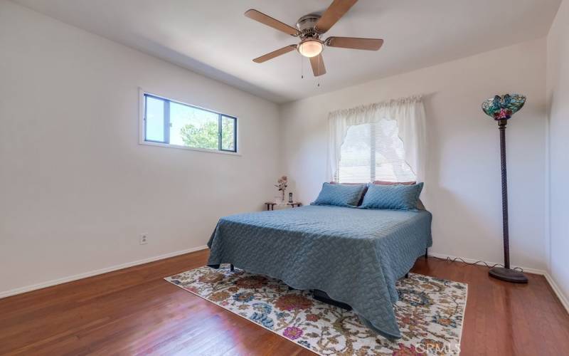 Front bedroom with original hardwood floors.