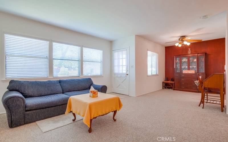 Living and dining area. Lots of natural light comes in.