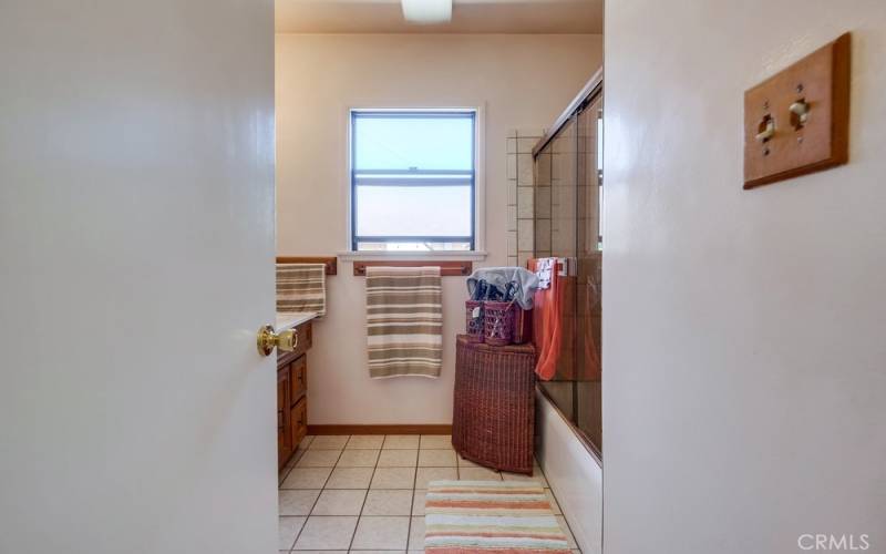 Main bath has tub over shower.